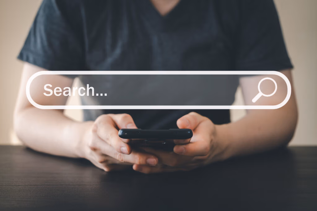 Man using mobile phone for searching and browsing internet infor